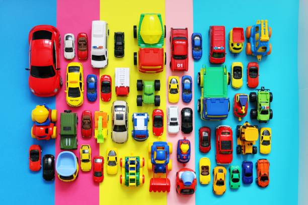 All sorts of toy vehicles on bright background